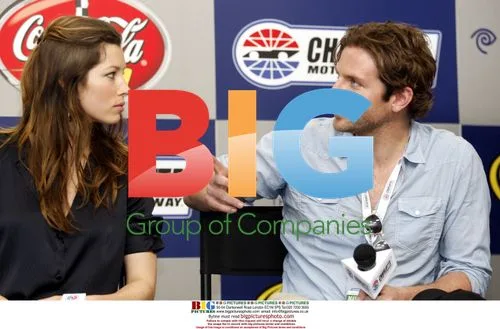 Jennifer Biel and Bradley Cooper at NASCAR event