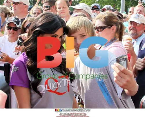 Kim Kardashian with fan at Indianapolis 500