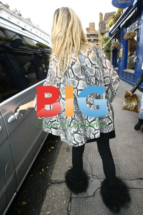 Abi Clancy and Family Leave Restaurant