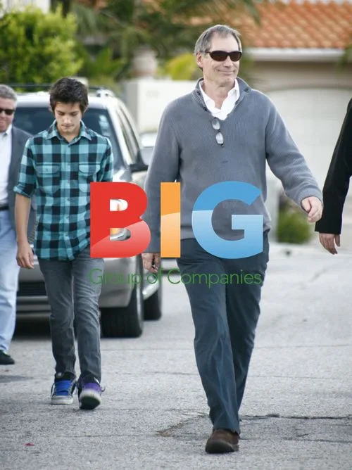 Timothy Dalton leaves Oksana Grigorieva's house