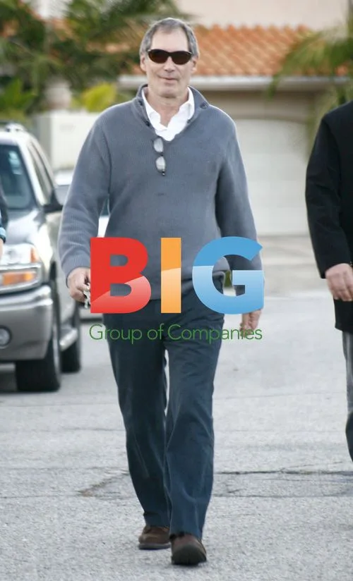 Timothy Dalton leaves Oksana Grigorieva's house