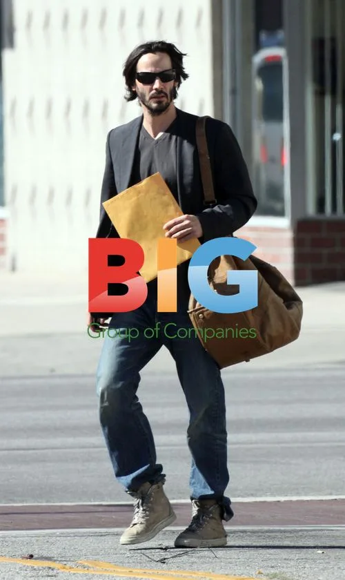 Keanu Reeves running errands, picking up sword