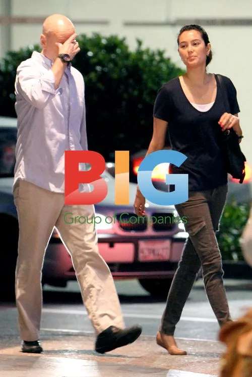 Bruce Willis and girlfriend on evening stroll