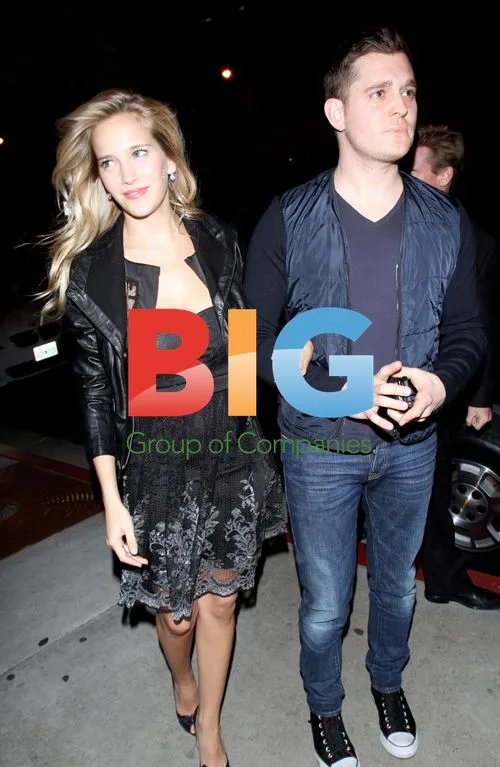 Michael Bubl and fiancee leaving BOA Steakhouse