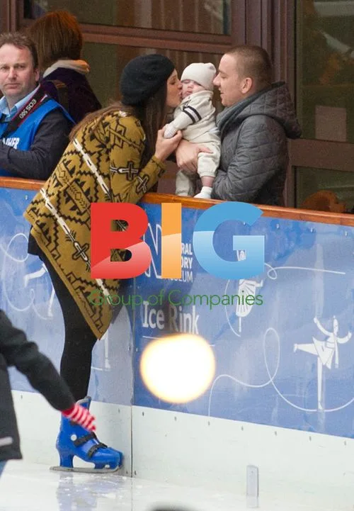 Danielle Lloyd and Jamie O'Hara Ice Skating with Kid