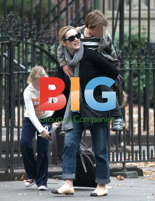 Kate Winslet picks up kids from school