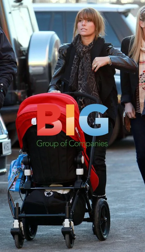 Coleen Rooney with son at Old Trafford