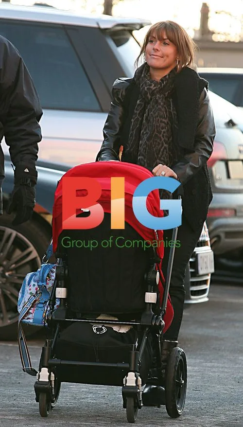 Coleen Rooney Watches Husband Wayne Play