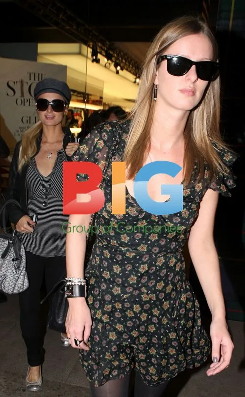 Paris and Nicky Hilton shopping at Mac Store