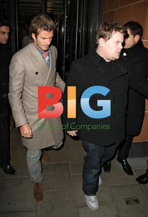 David Beckham leaves restaurant with friends