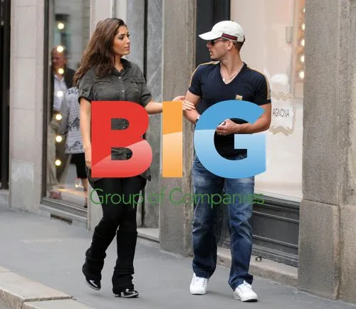 Footballer Wesley Sneijder and wife Yolanthe shopping in Milan