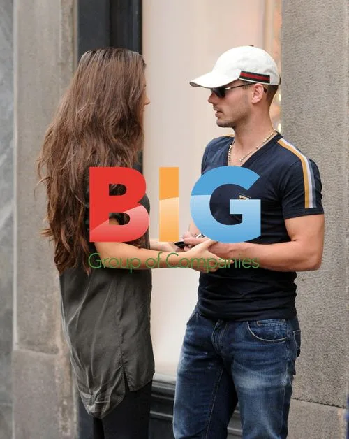 Footballer Wesley Sneijder and wife Yolanthe shopping