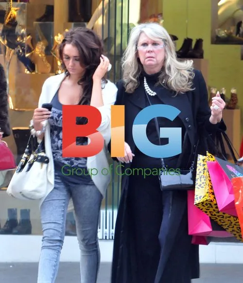 Les Dawson's Wife & Daughter Out Shopping