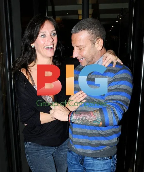 Model Lisa Forward and Boyfriend Robert Curtis Leaving Restaurant