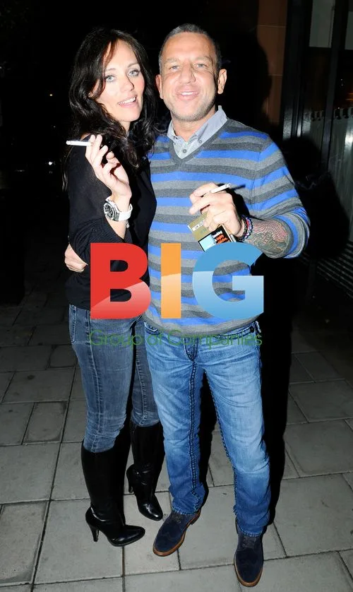 Model Lisa Forward and boyfriend Robert Curtis leaving restaurant