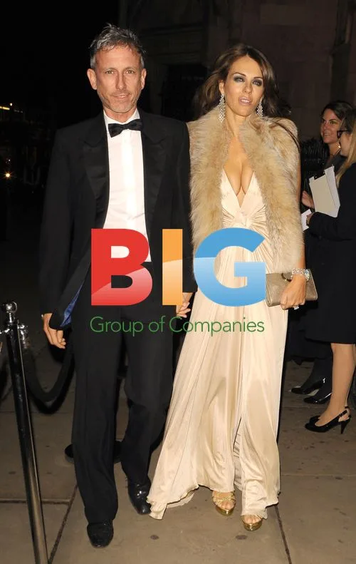 Patrick Cox and Elizabeth Hurley at Party