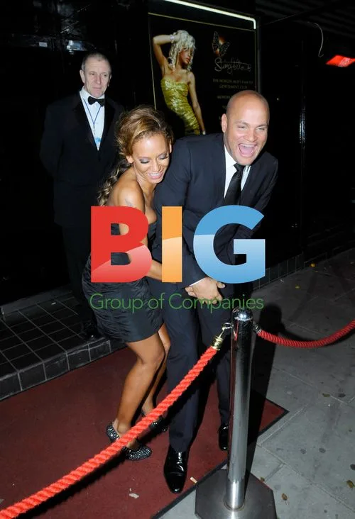Mel B jokingly grabs Stephen Belafonte's crotch