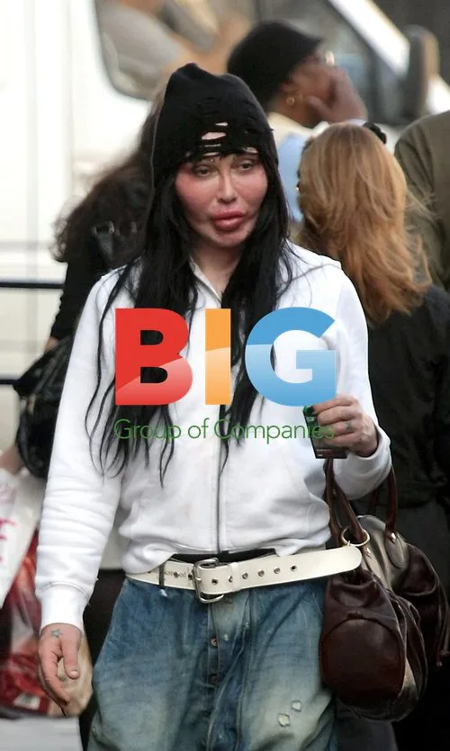 Pete Burns and Boyfriend Out in London
