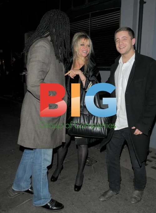 Jo Wood and son Tyrone leaving Groucho