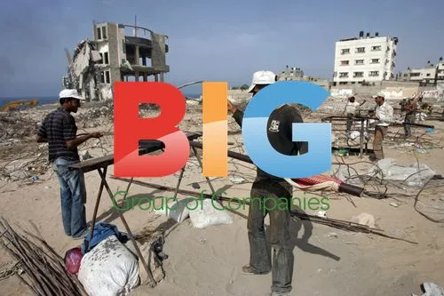 Palestinians collect iron from Gaza hotel ruins