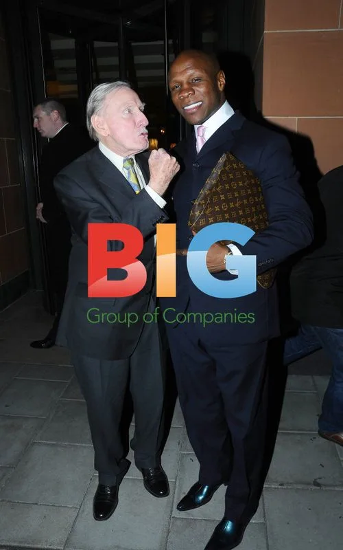Leslie Phillips and Chris Eubank outside Ciprianis
