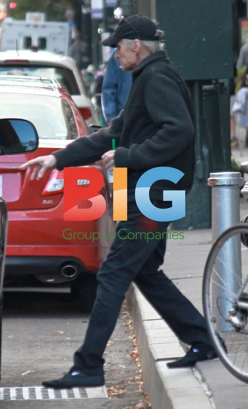 Michael Douglas Leaving Apartment