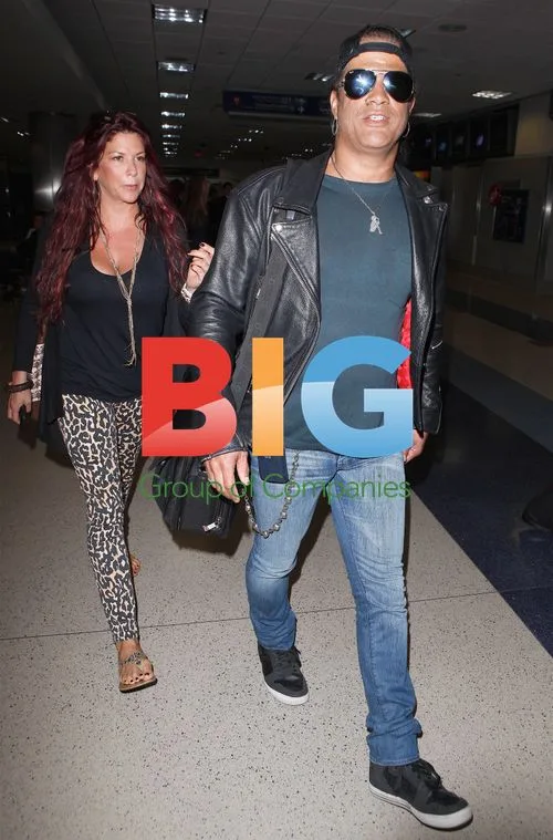 Slash and Perla Hudson at LAX