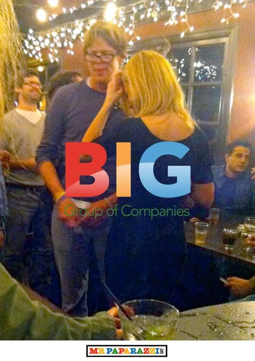 Kris Marshall drinks and dances with blonde