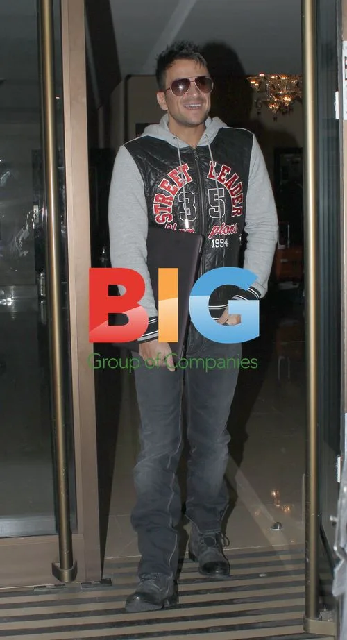Peter Andre Leaving Hotel with Laptop