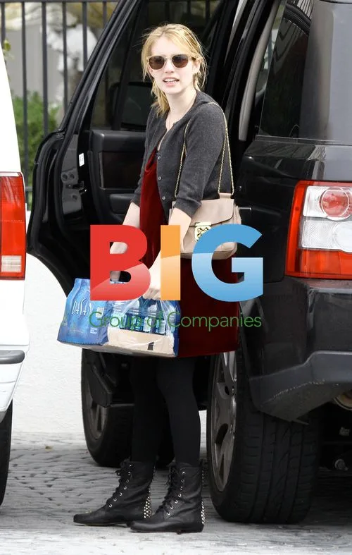 Emma Roberts Carries Water Bottles