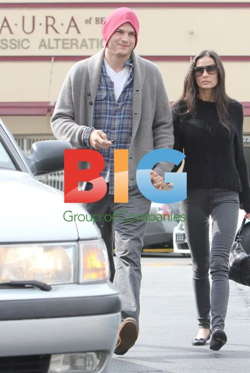 Ashton Kutcher Opens Car Door for Demi Moore
