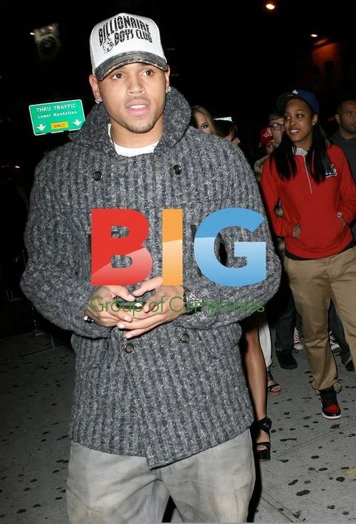 Chris Brown Walks with Friends in NY