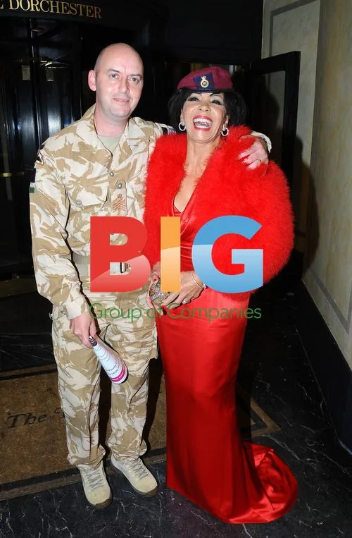 Dame Shirley Bassey and Julian Hoggarth at Fashion For the Brave