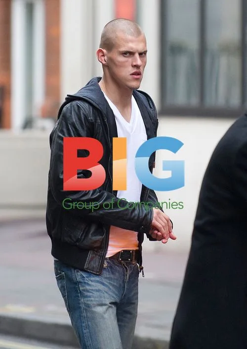 Martin Skrtel and Girlfriend Leaving Mayfair Hotel