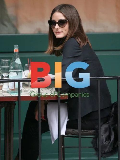 Olivia Palermo hails a cab in NYC