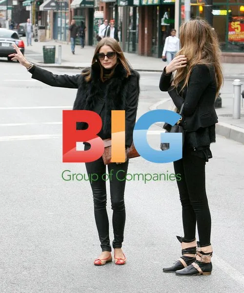 Olivia Palermo hails a cab in NYC