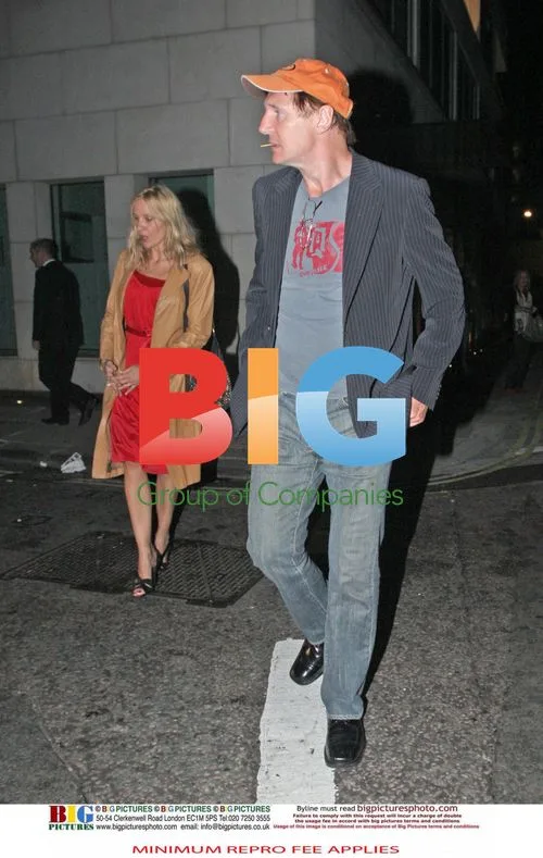 Liam Neeson spotted with mystery blonde