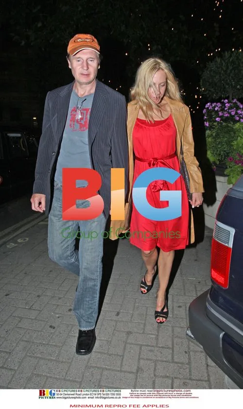 Liam Neeson spotted with blonde companion