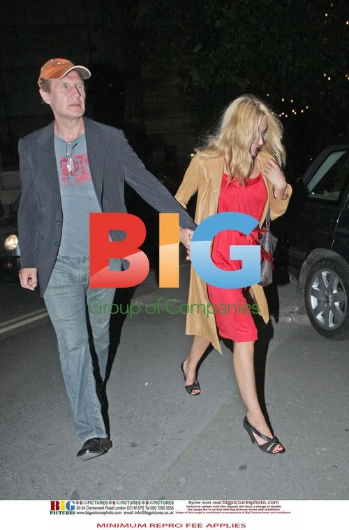 Liam Neeson spotted with mystery blonde
