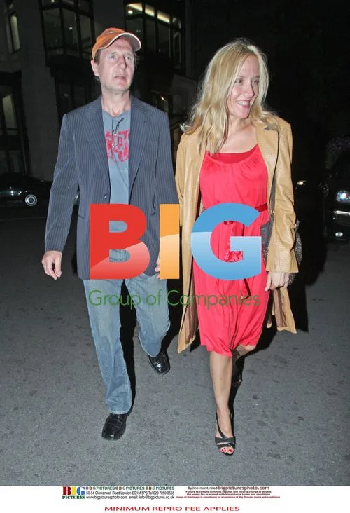 Liam Neeson with Blonde Woman