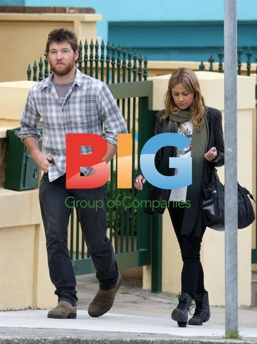 Sam Worthington and Natalie Mark walk in Sydney