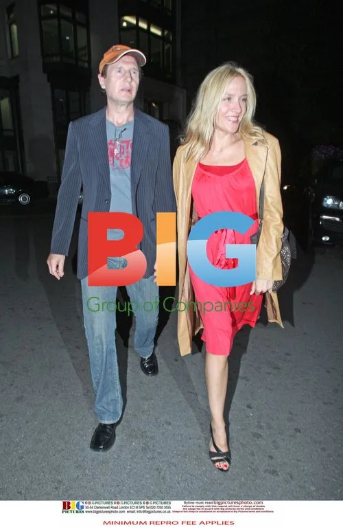 Liam Neeson with Blonde Beauty