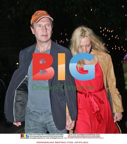 Liam Neeson spotted with mystery blonde