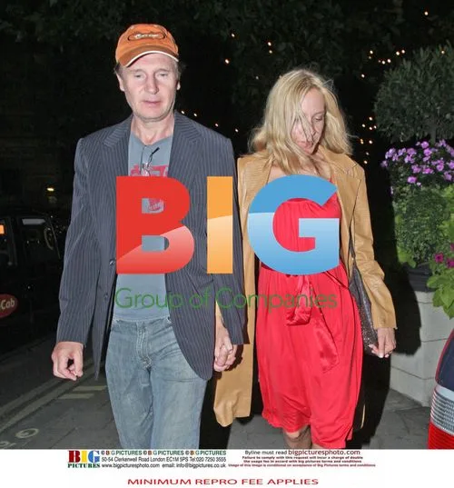 Liam Neeson with Blonde Companion