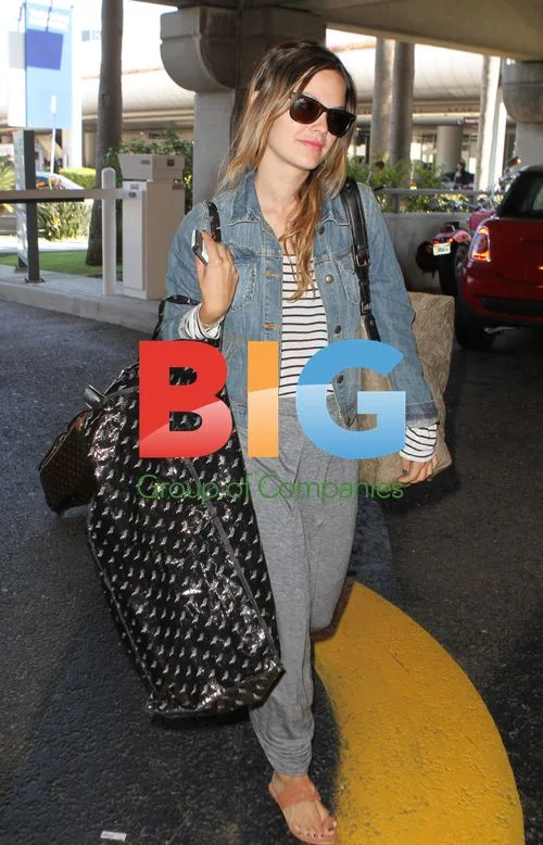 Rachel Bilson returns to LA from NYFW