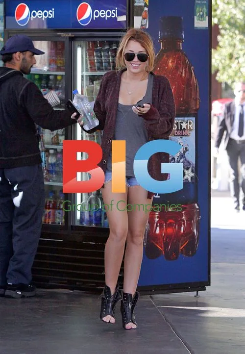 Miley Cyrus Stops for Water