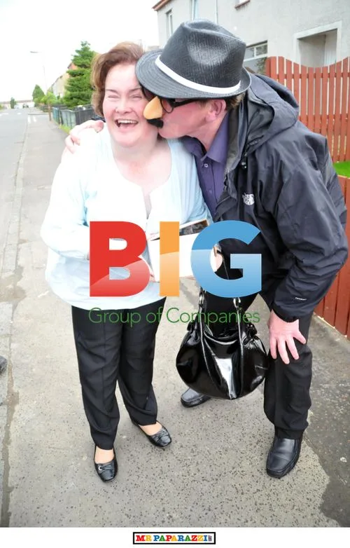 Susan Boyle Poses with Fans