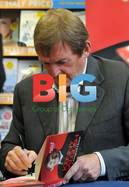 Kenny Dalglish signs book in Liverpool