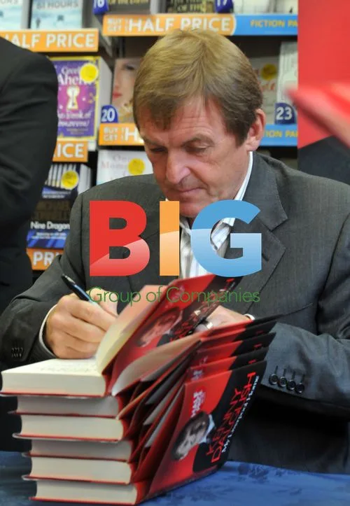 Kenny Dalglish Signs Book