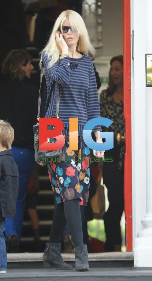 Claudia Schiffer and Stella McCartney on school run